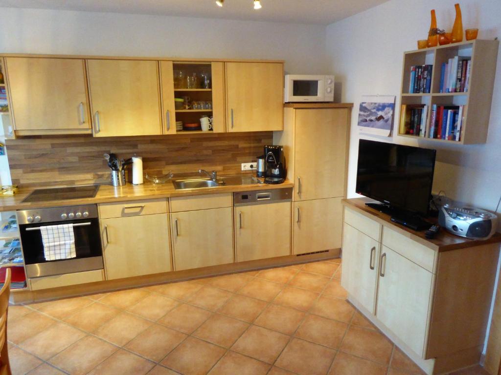 Kuchyň nebo kuchyňský kout v ubytování Appartement Ramona