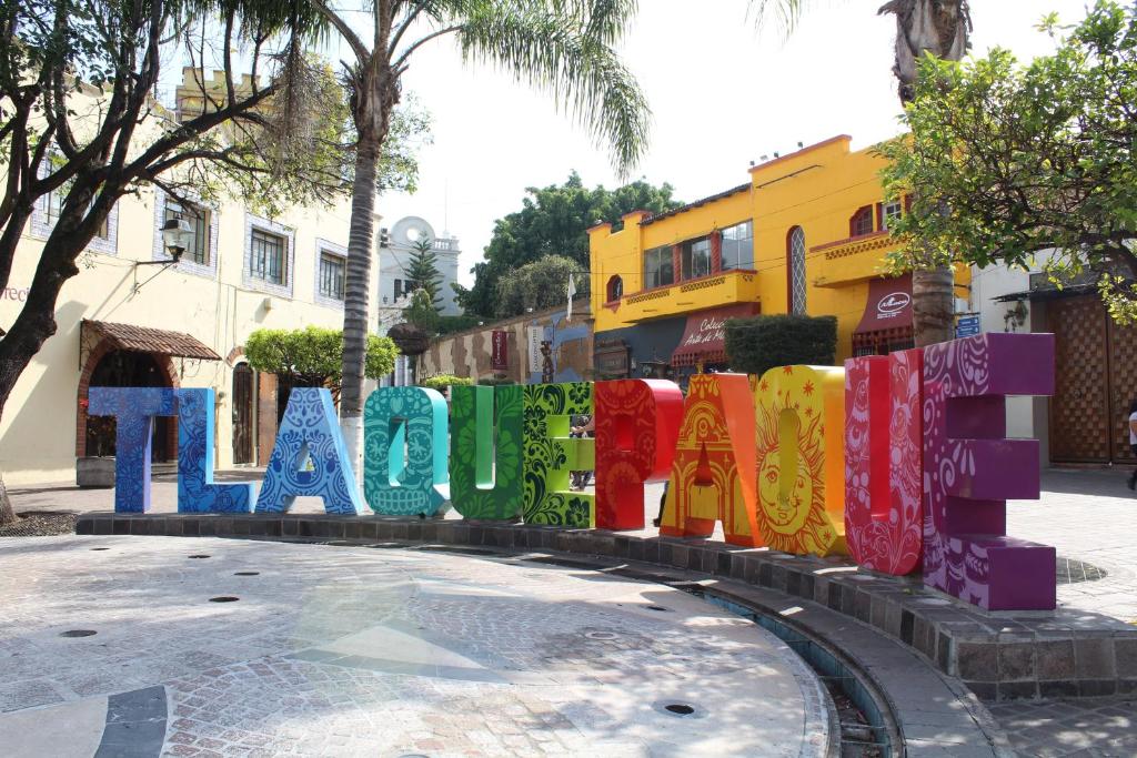 a sign with the word havana in a street at Luxury Department Tlaquepaque in Guadalajara