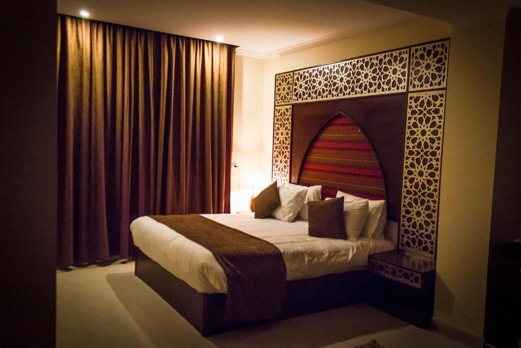 Postel nebo postele na pokoji v ubytování Pyramids Valley Boutique Hotel