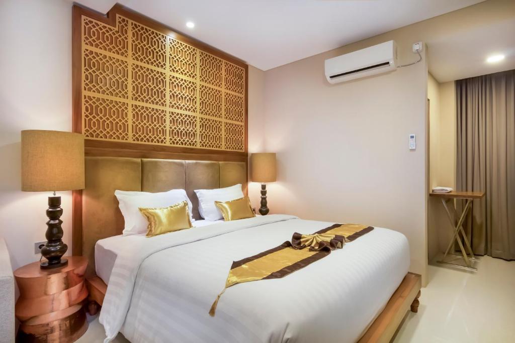 Letto o letti in una camera di Raintree Boutique Villa & Gallery