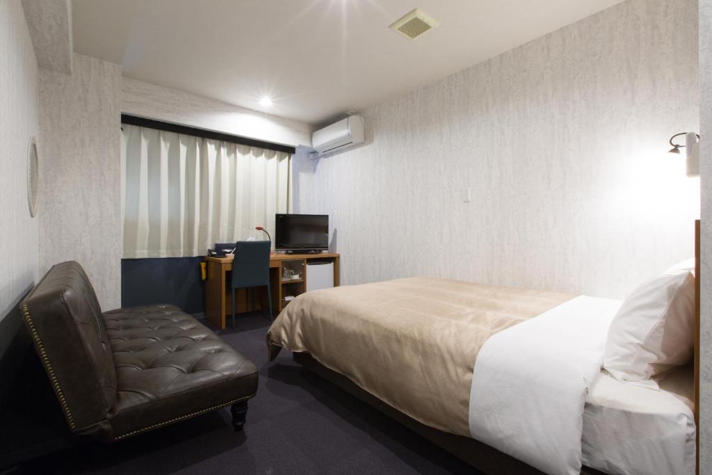 Postel nebo postele na pokoji v ubytování Global Resort ONO de LUNE
