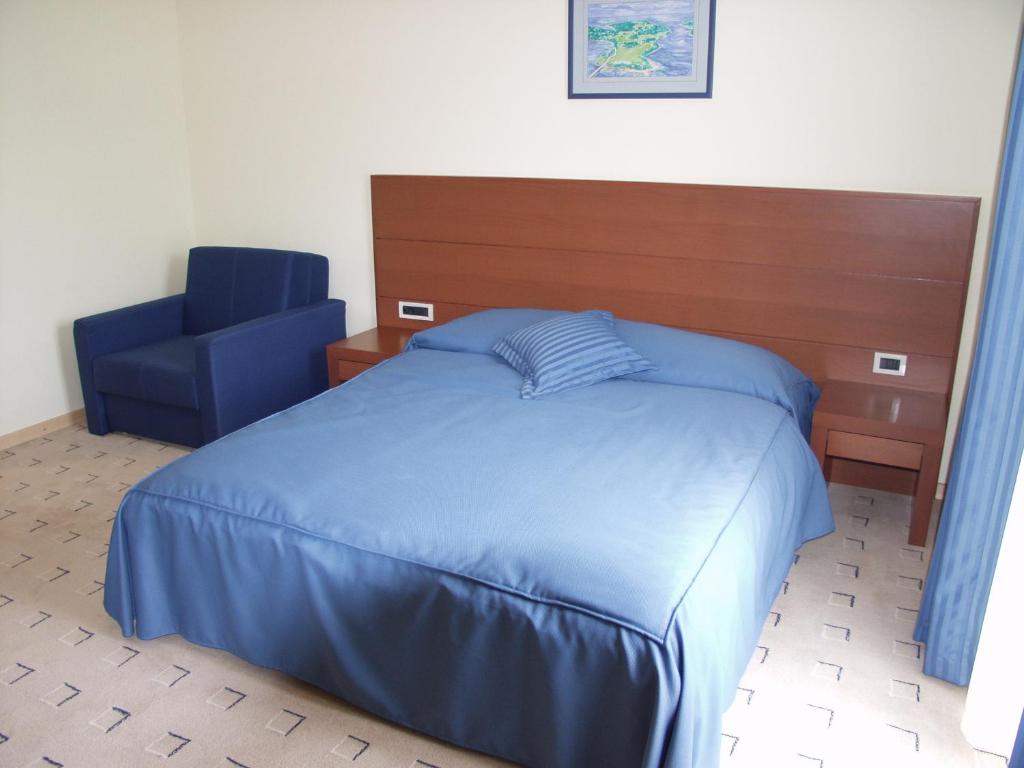 Postel nebo postele na pokoji v ubytování Hotel Park