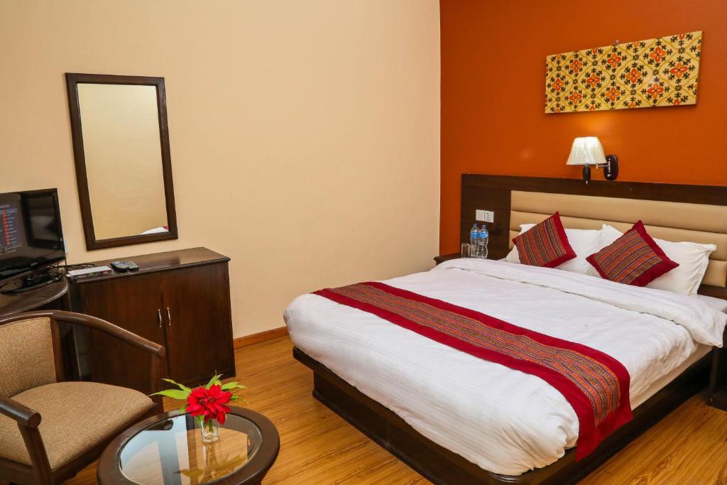 Postel nebo postele na pokoji v ubytování Hotel Namtso