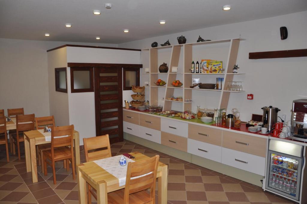 Nápoje v ubytování Hotel Noble
