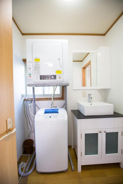 Kuchyň nebo kuchyňský kout v ubytování Tsubaki House