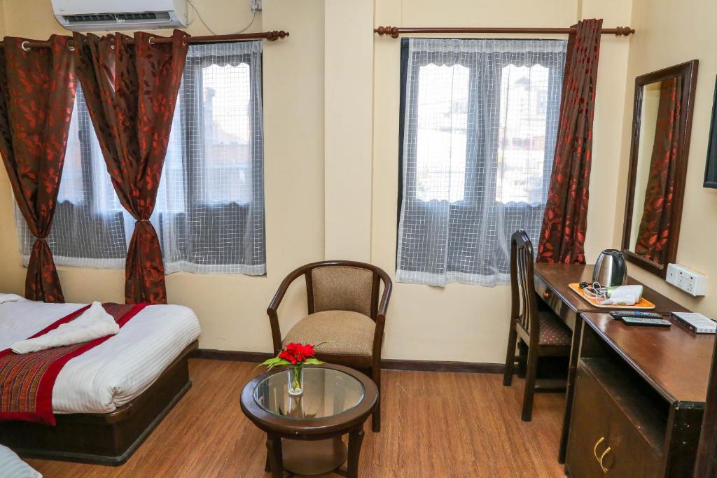 Postel nebo postele na pokoji v ubytování Hotel Namtso