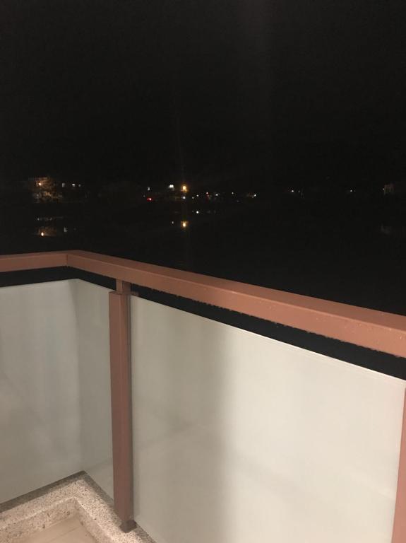 Balkón nebo terasa v ubytování Jin