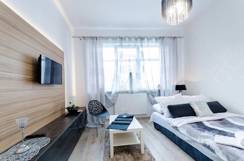 Telewizja i/lub zestaw kina domowego w obiekcie Venice Apartments/Old Town