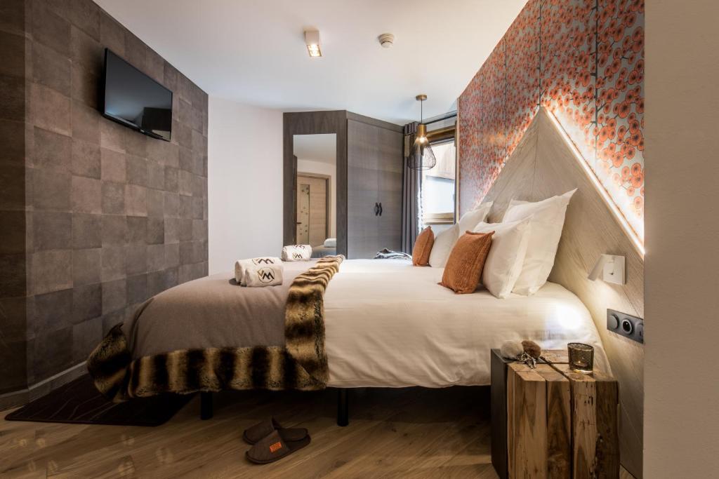 Postel nebo postele na pokoji v ubytování Chalet Skadi - Village Montana