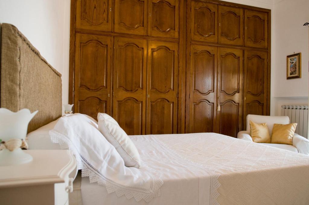 Postel nebo postele na pokoji v ubytování B&B Mamma Rosa Positano