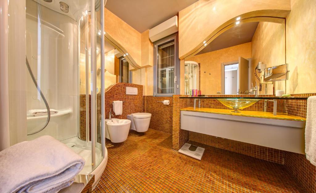 Ванная комната в Hotel Waldorf- Premier Resort