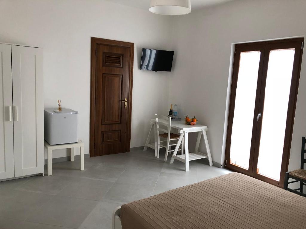 Postel nebo postele na pokoji v ubytování De Nittis' Rooms