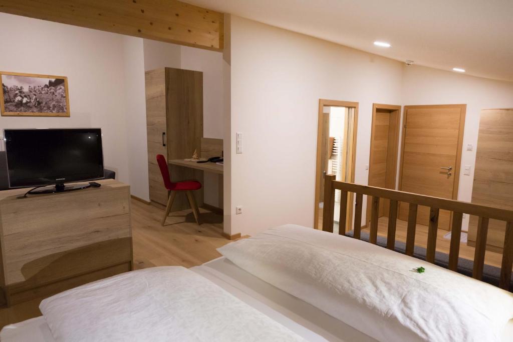 Posteľ alebo postele v izbe v ubytovaní Hotel Rosner