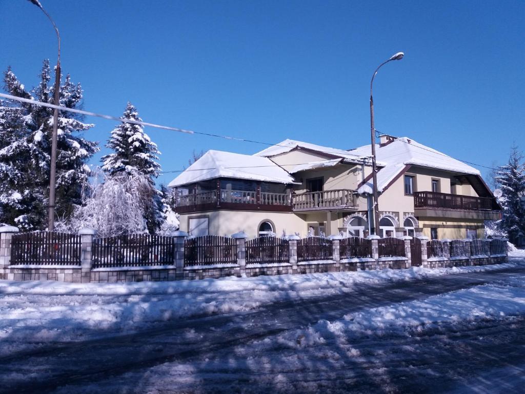 Apartamenty pod Holicą v zime