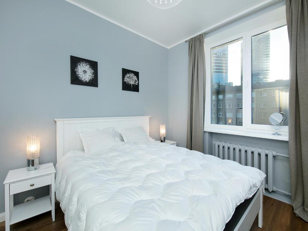 En eller flere senge i et værelse på Gonsiori 7 Lux Apartment