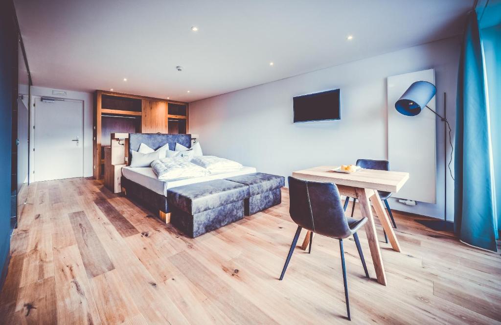 Postel nebo postele na pokoji v ubytování Spaces Hotel