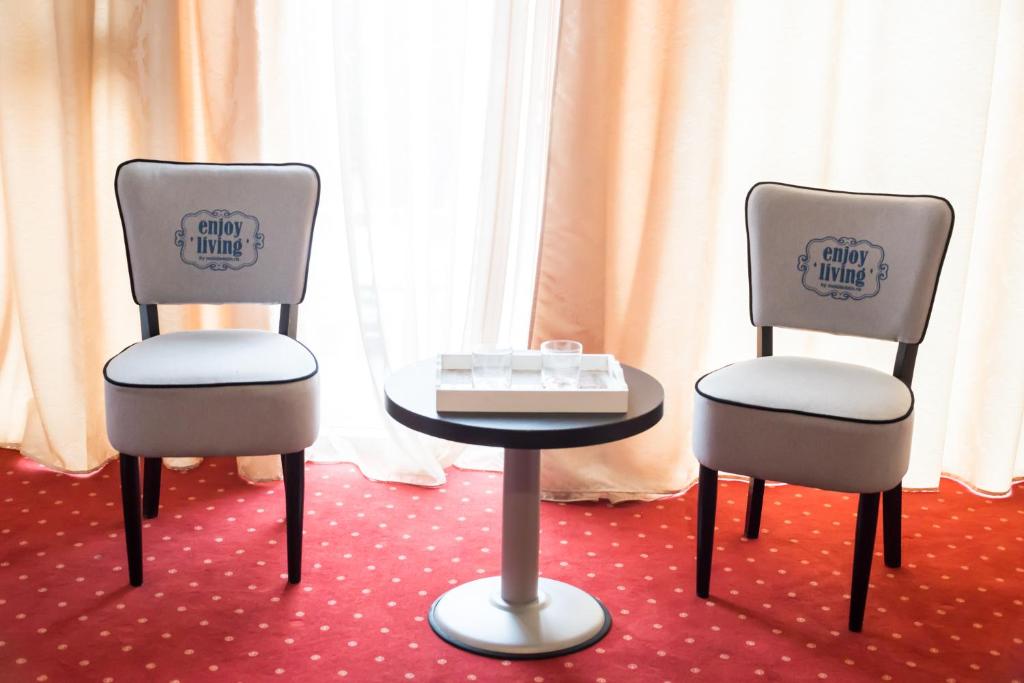 Posezení v ubytování Hotel Corona