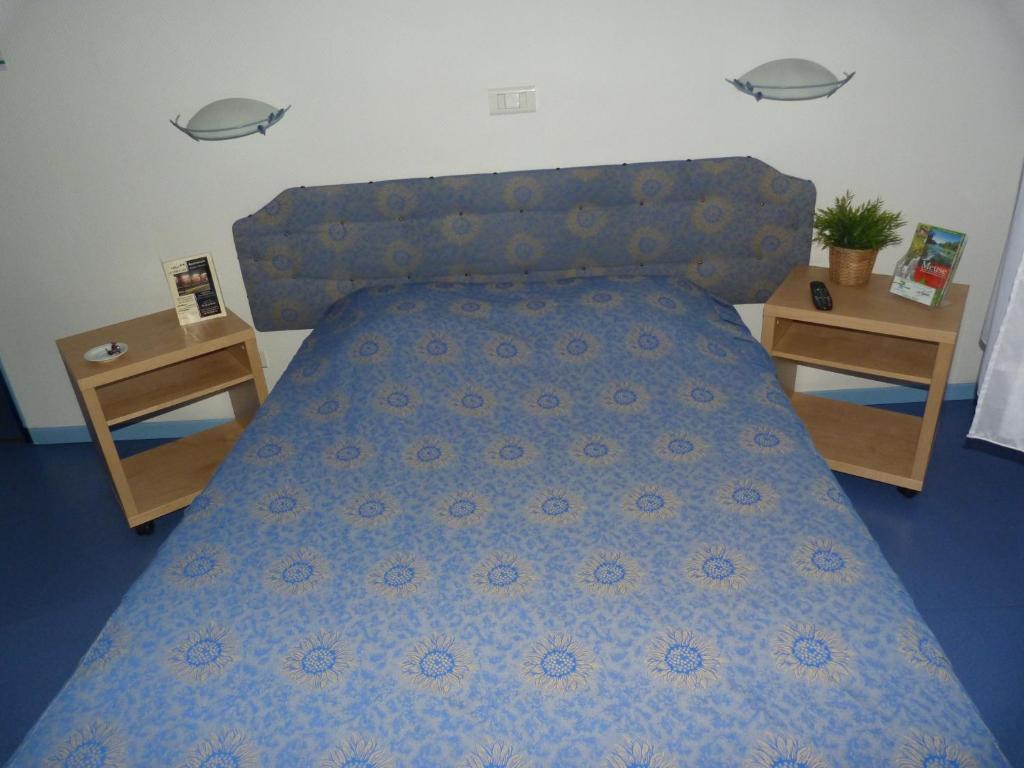 Postel nebo postele na pokoji v ubytování La Table Des Bons Peres