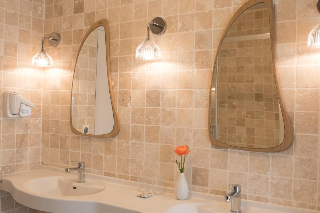Koupelna v ubytování Le Central Boutique Hôtel