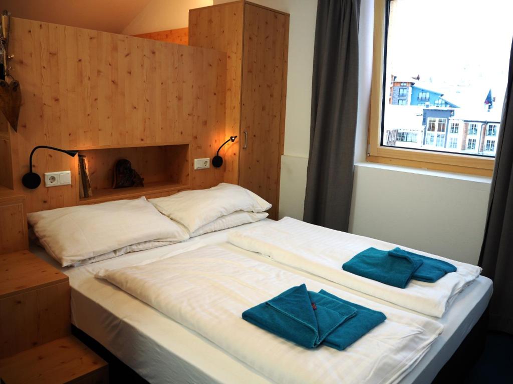 Postel nebo postele na pokoji v ubytování DAV-Haus (Alpenverein)