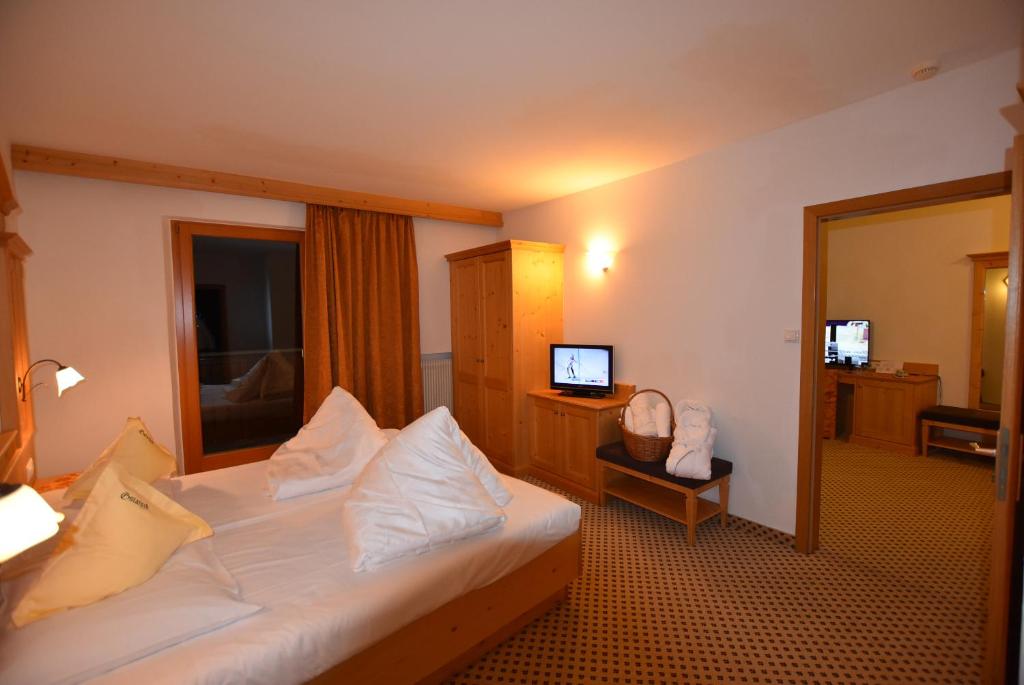 Voodi või voodid majutusasutuse Hotel Gstatsch toas