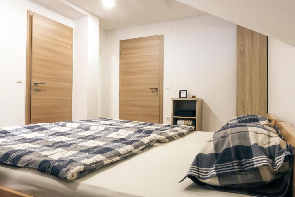 Postel nebo postele na pokoji v ubytování Apartment and rooms Maraton