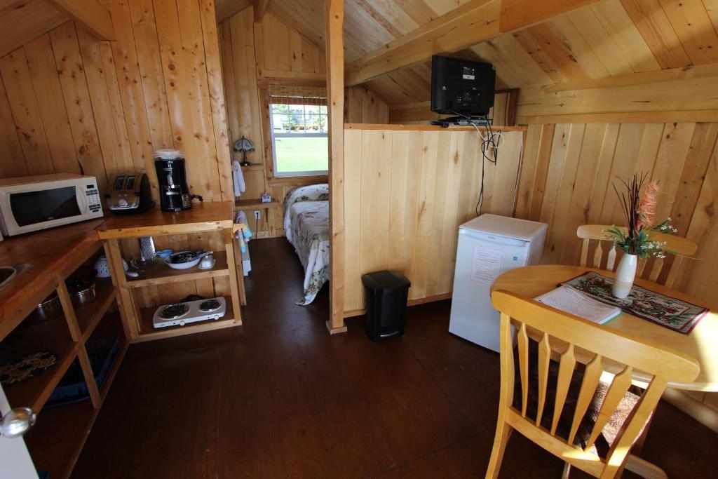 Kuchyň nebo kuchyňský kout v ubytování Chalets Nature Océan