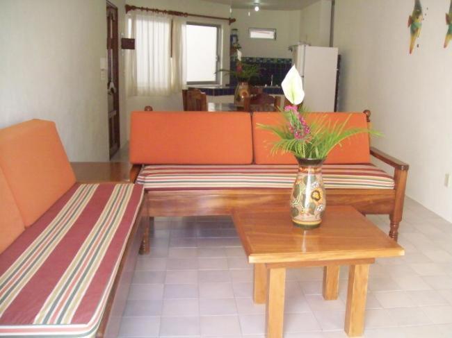 Posezení v ubytování Hotel y Suites Corita