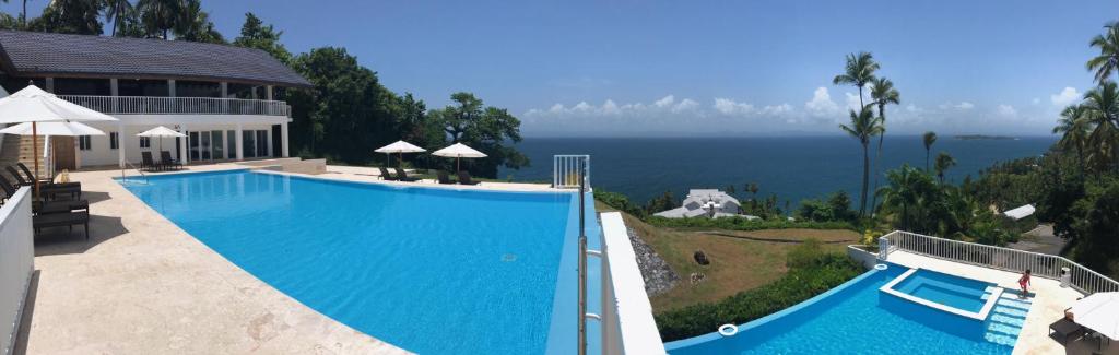 A view of the pool at Vista Mare Ocean View Top Floor Condo, Samana or nearby