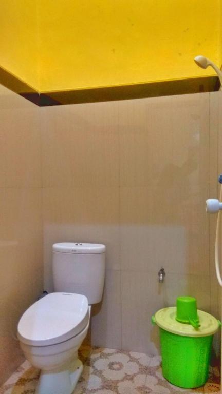 Koupelna v ubytování Penginapan Kahan