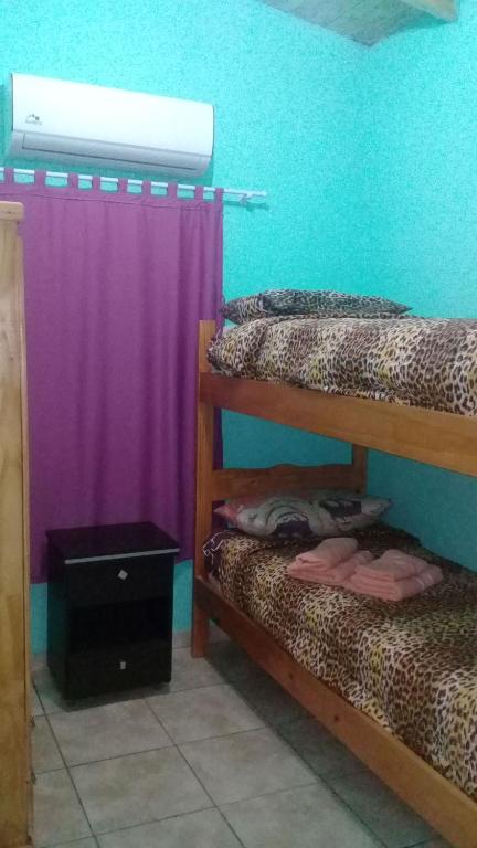 Una cama o camas cuchetas en una habitación  de Iguazu...mi lugar en el ?