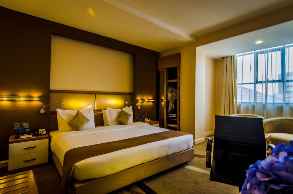 Postel nebo postele na pokoji v ubytování PrideInn Azure Hotel Nairobi Westlands