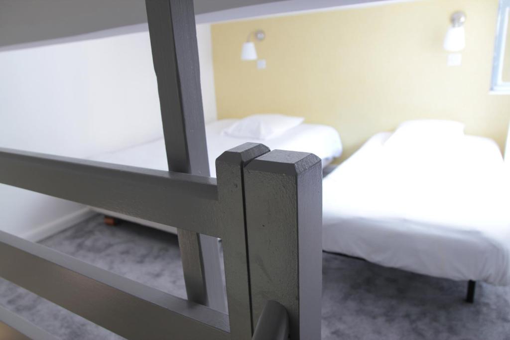 Postel nebo postele na pokoji v ubytování Au Patio Morand