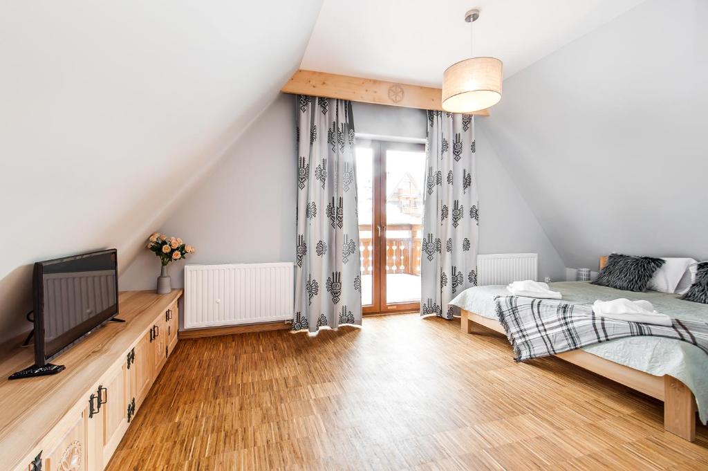 Apartamenty Sun & Snow Resorts Lipki Park z sauną - Studio Apartment