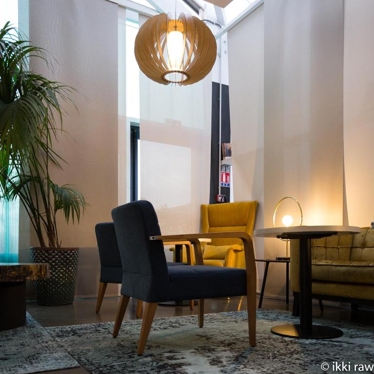 Posezení v ubytování Hotel Libera Caen Colombelles