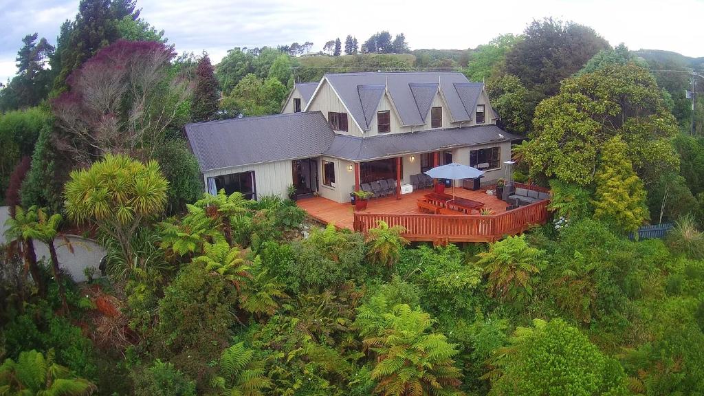 an aerial view of a house on a hill at Hokitika Sunset Lodge in Hokitika