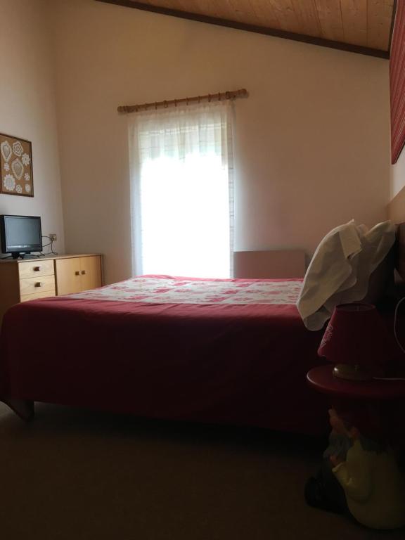 Postel nebo postele na pokoji v ubytování B&B Monte Giove Formazza