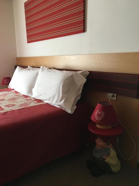 Postel nebo postele na pokoji v ubytování B&B Monte Giove Formazza