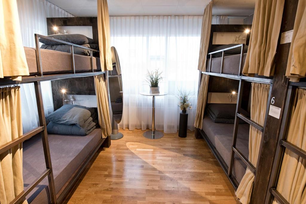 Postel nebo postele na pokoji v ubytování B14 Hostel