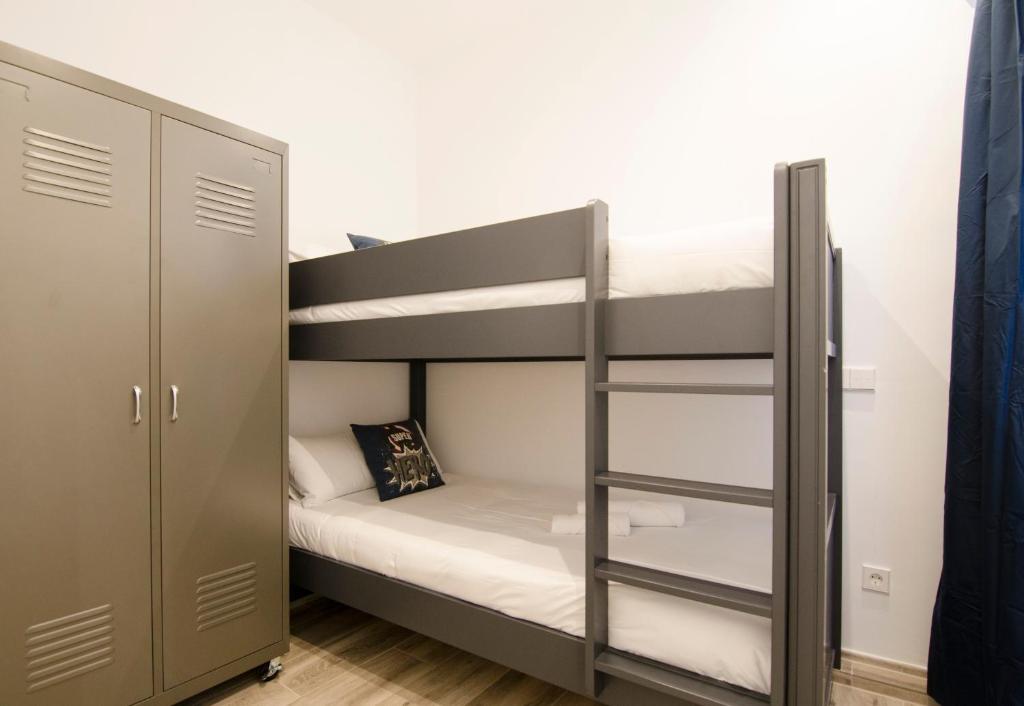A bed or beds in a room at Luminoso familiar- 2D 2B- Cava Alta