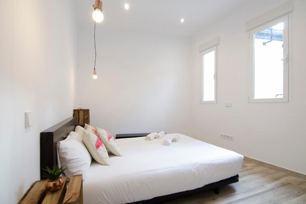 A bed or beds in a room at Luminoso familiar- 2D 2B- Cava Alta