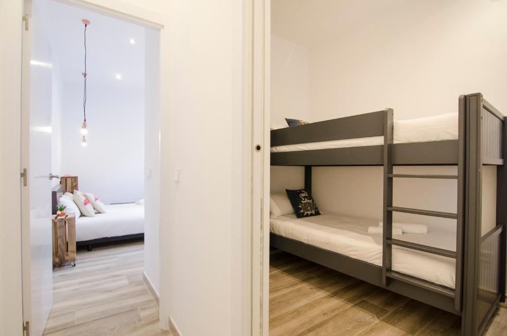 A bed or beds in a room at Luminoso familiar- 2D 2B- Cava Alta