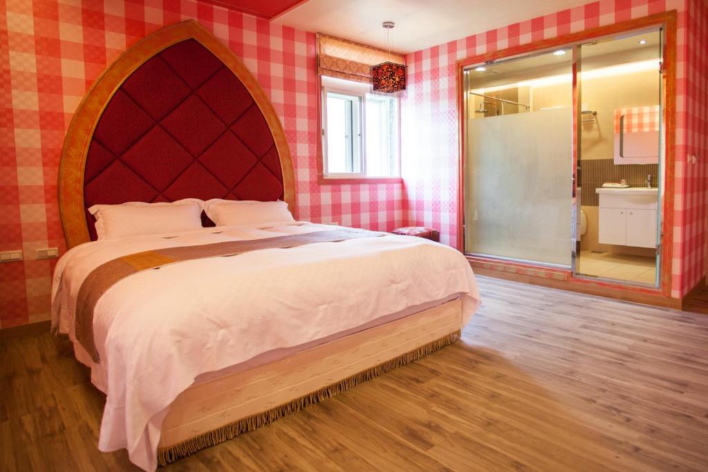 Postel nebo postele na pokoji v ubytování Zhuyuan Ju B&B