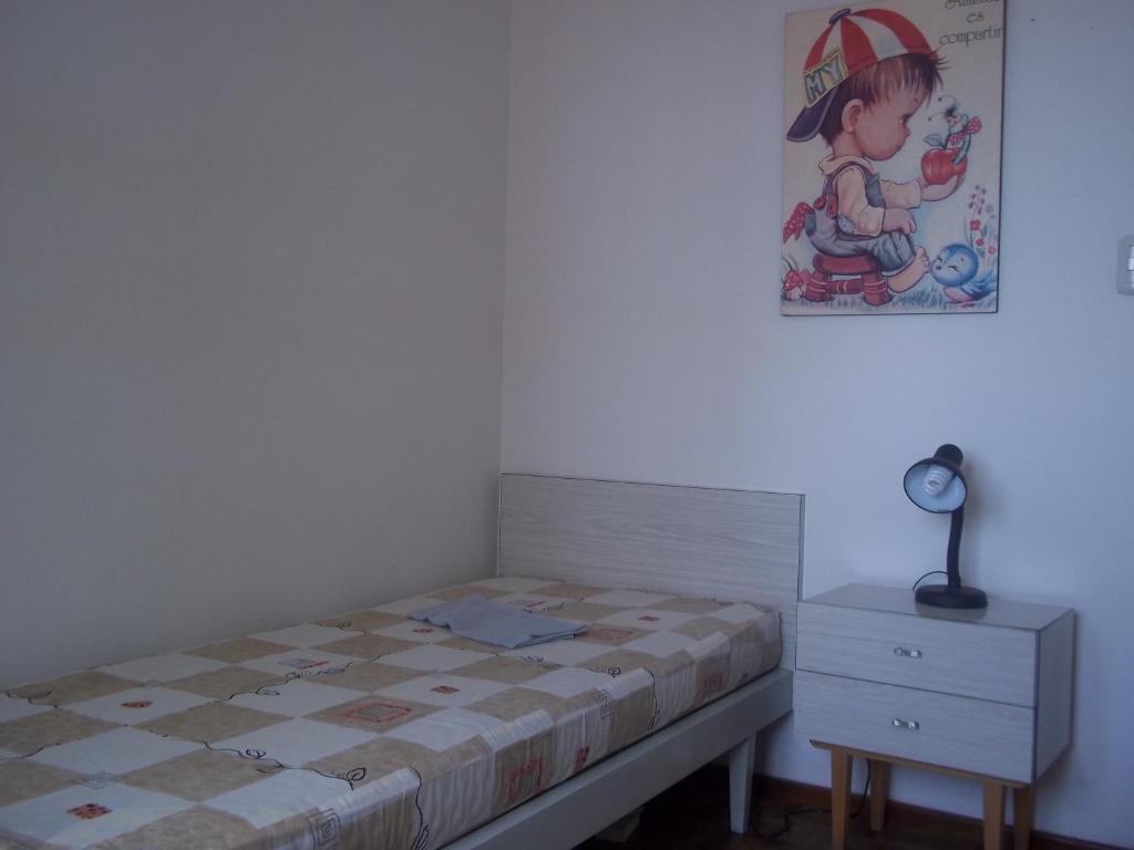 Кровать или кровати в номере Necochea Frente al Mar