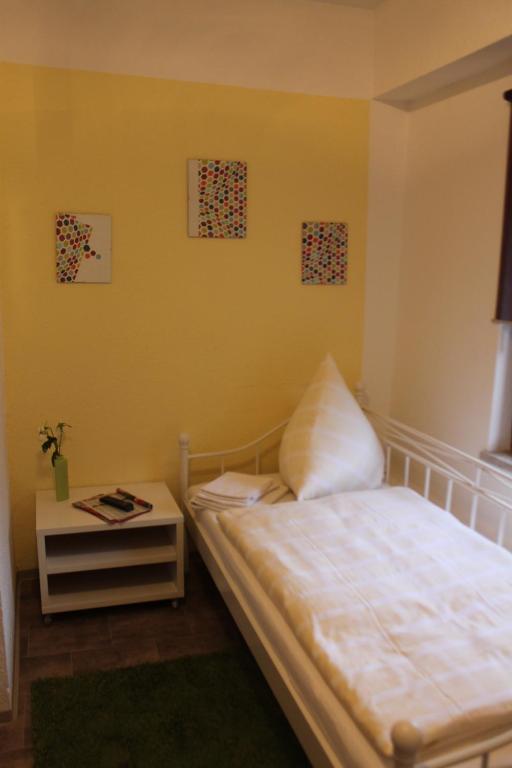 Postel nebo postele na pokoji v ubytování Berl Inn