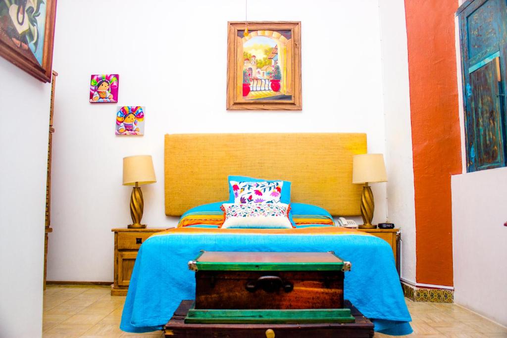 Postel nebo postele na pokoji v ubytování Casona Tlaquepaque Temazcal & Spa