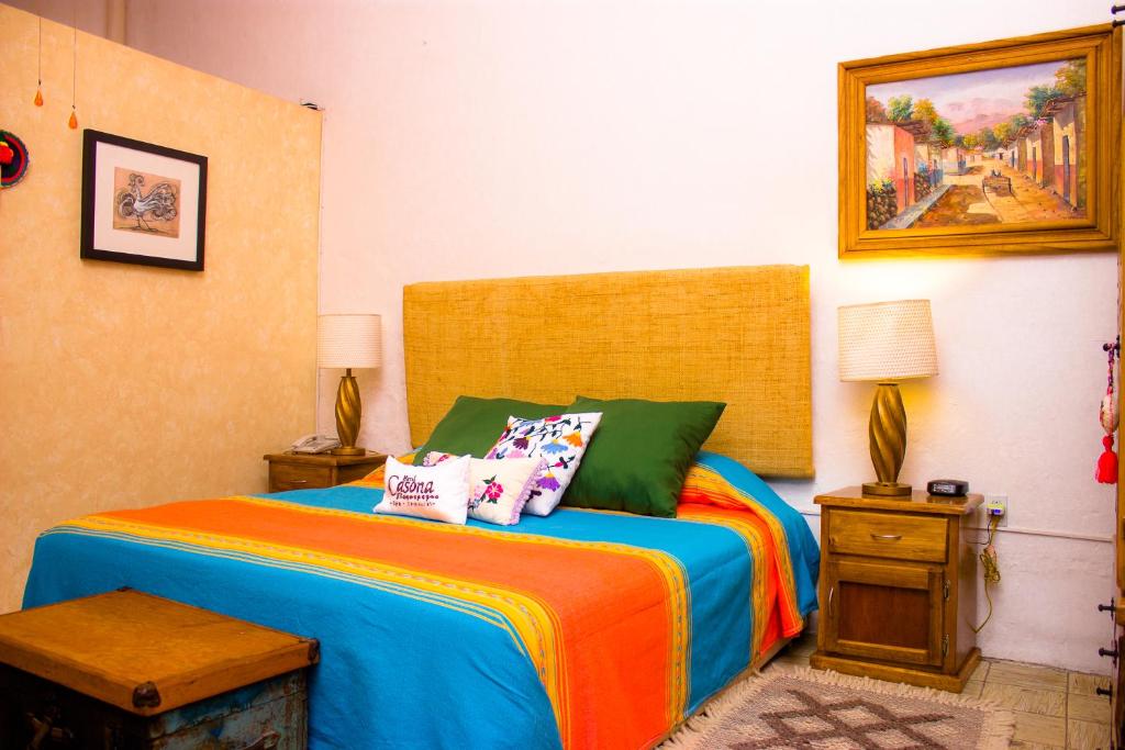 Postel nebo postele na pokoji v ubytování Casona Tlaquepaque Temazcal & Spa