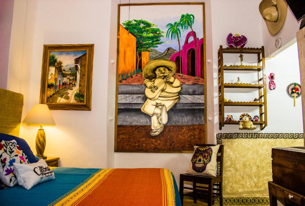 Postel nebo postele na pokoji v ubytování Casona Tlaquepaque Temazcal & Spa