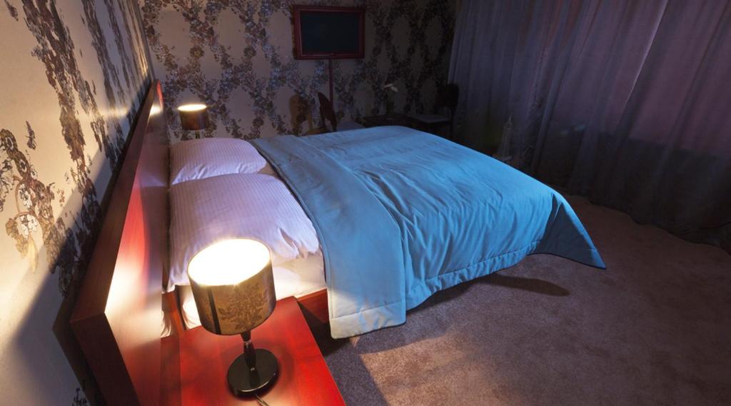 Cama o camas de una habitación en Residence Arx & Wellness