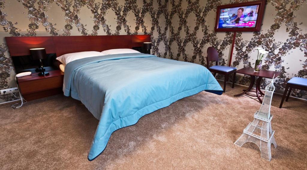 Cama o camas de una habitación en Residence Arx & Wellness